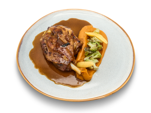 Braó de porc al pebre negre amb puré de boniato i endívies